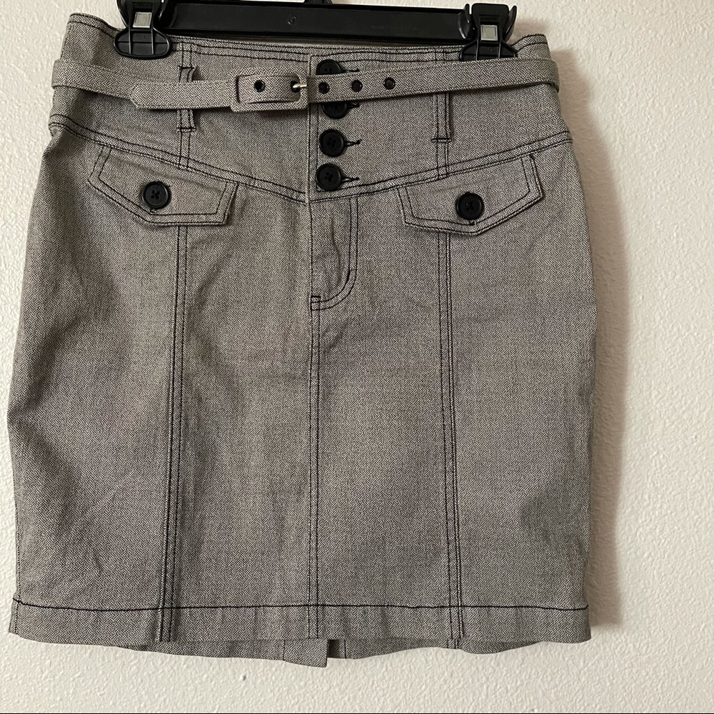 Super cute high waisted button up skirt.
